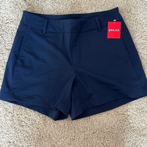 Spanx sunshine shorts size 4. Navy blue. Never worn.